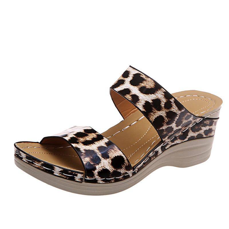 http://justcuban.com/cdn/shop/products/sursell-leopard-us-4-5-sursell-women-s-casual-slope-heel-snake-print-slippers-37423200370939.jpg?v=1663151327